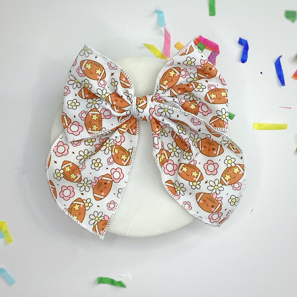 Cutesy Football Bow Strip and Scrunchie Collection