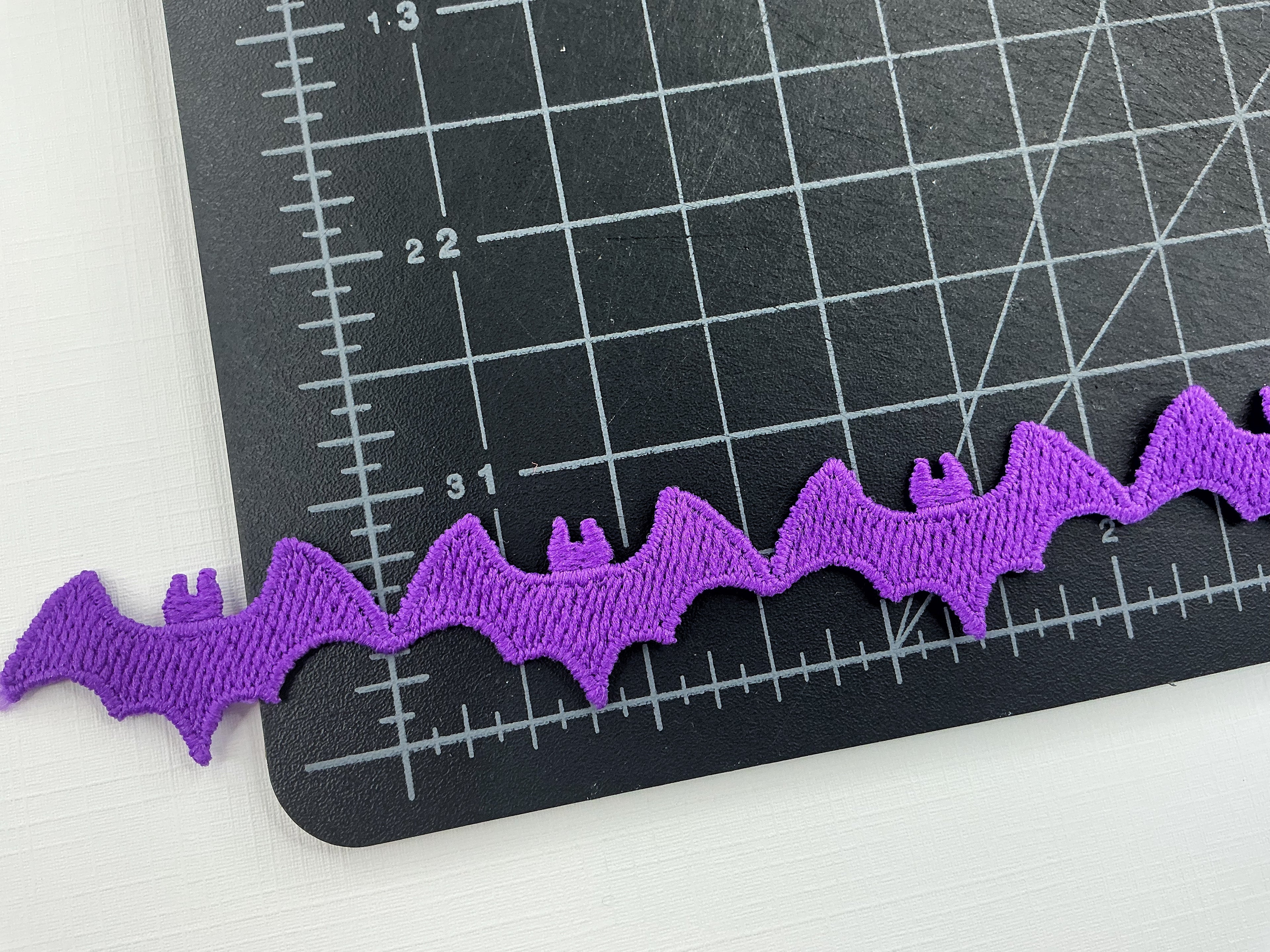 Purple Bat Guipure Lace