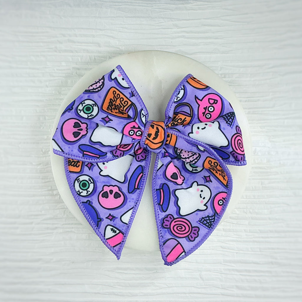 Purple Trick or Treat Pre-Tied Bow Strip and Scrunchie Collection