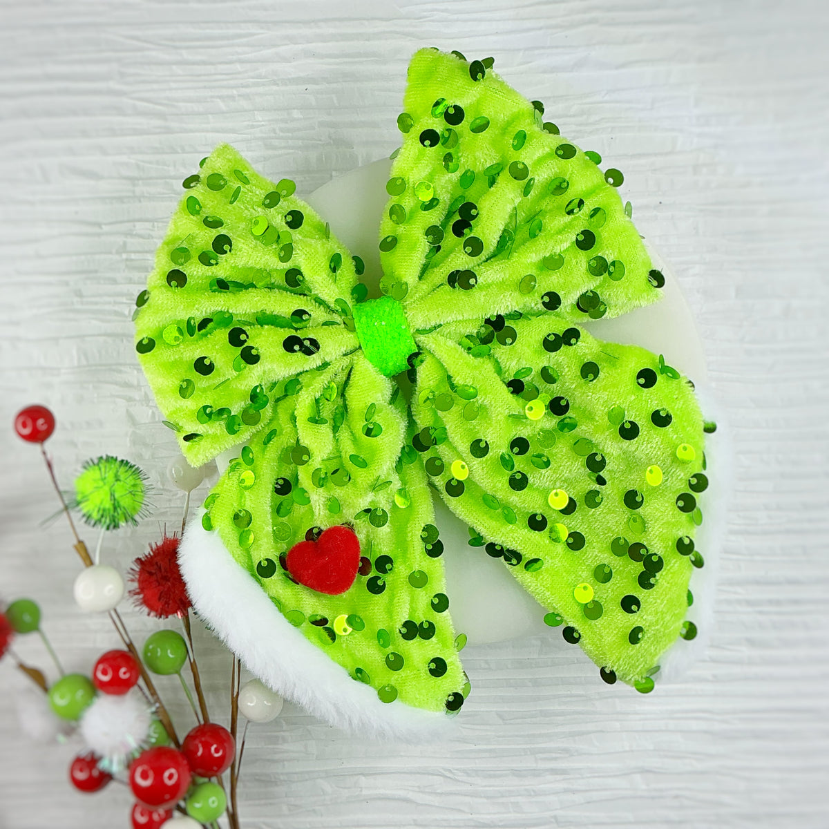 Fur Trimmed Sailor Mean Green Santa Bow