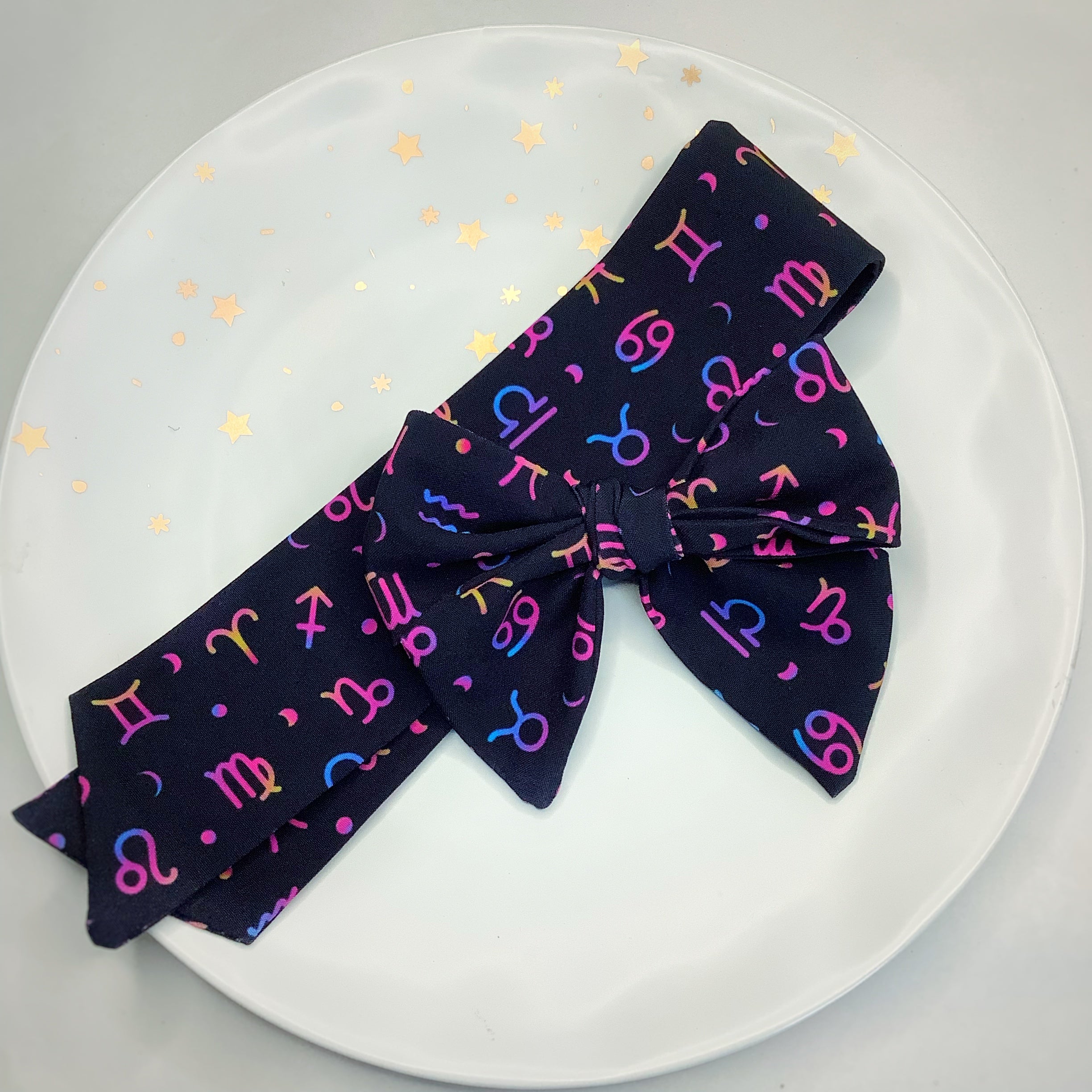 The Zodiac Bow Strip and Scrunchie Collection